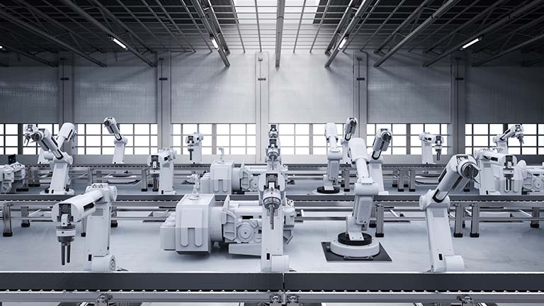 Robots working on a factory production line